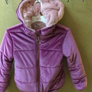 Child’s purple jacket